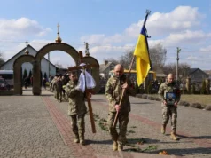 У селі Тарасове прощалися з воїном Сергієм Гузієм